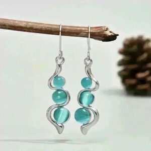 New Blue Bead Dangle Earrings: Modern Silver-Tone Earrings with Wavy Design